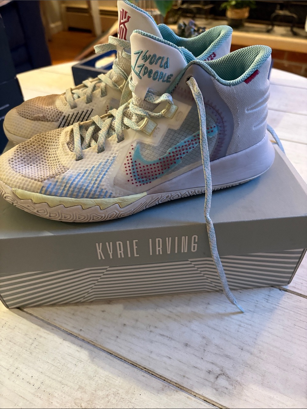 Nike Kids High-Top Sneakers in White with Teal Accents